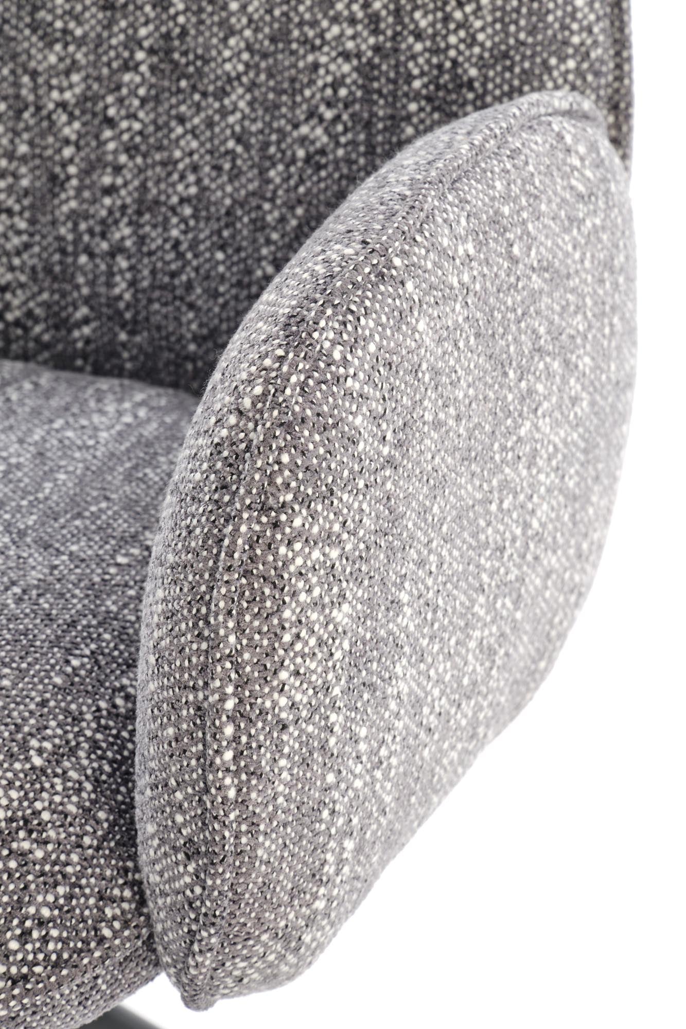 Krzesło PUCHATEK – eleganckie, obrotowe krzesło tapicerowane w popielatym odcieniu, zbliżenie na tkaninę i podłokietnik.